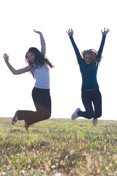 beautiful teenager  woman jumping outdoors