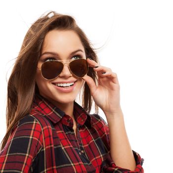 Young attractive woman in squared shirt and sunglasses