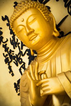Golden Buddha statue at the World Peace Pagoda in Pokhara, Nepal