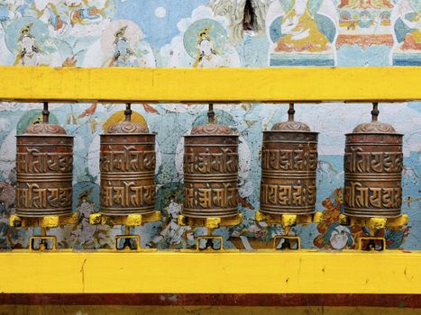 Prayer wheels at Bodhnath stupa in Kathmandu, Nepal