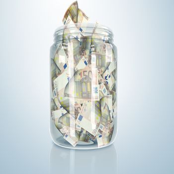 Transparent glass jar with money inside it