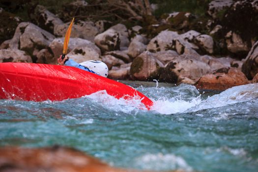 Kayaking in the summer on the Soca river, Slovenia