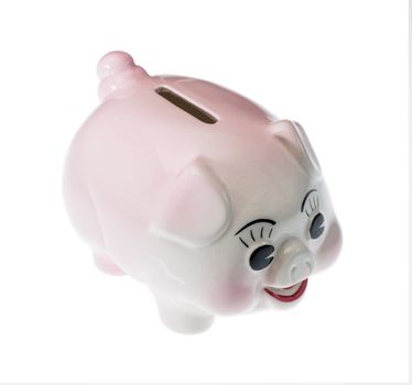 A pink pottery piggy bank isolated against white with clipping path