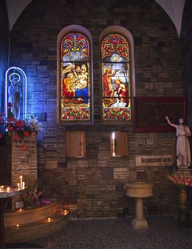 Mary Shrine Statue Stained Glass Notre Dame Cathedral, Nha Tho Duc Ba, build in 1883 largest cathedral in French Empire Saigon Ho Chi Minh City Vietnam