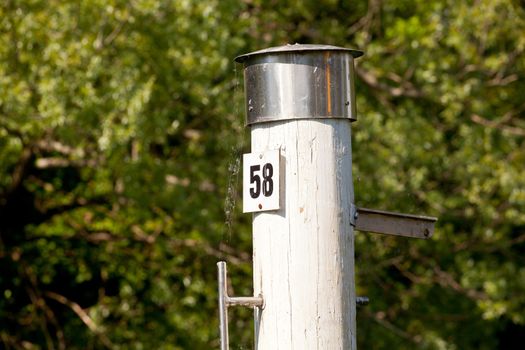 Photo of a Pole with fifty eight number