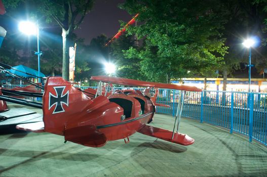 at the amusement park at night