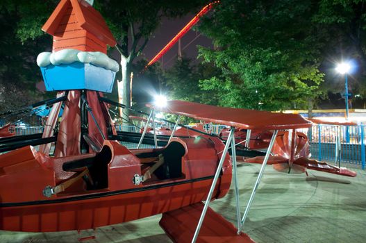 at the amusement park at night