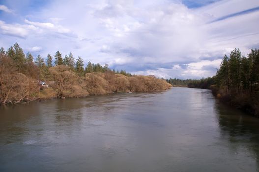 water flows slowly in spokane river washington