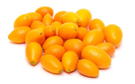 Heap Kumquat fruit (Fortunella) on white background