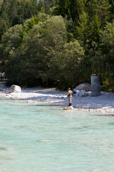 Photo of a Fisherman in the Soca river, Slovenia