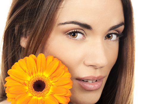 attractive smiling woman portrait with flower 