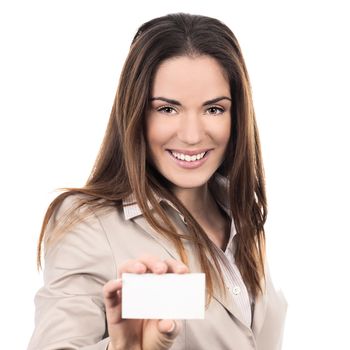 business woman holding a blank business card over white background 