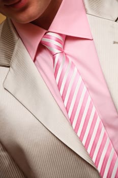 Man's style. suit, shirt and necktie with striped