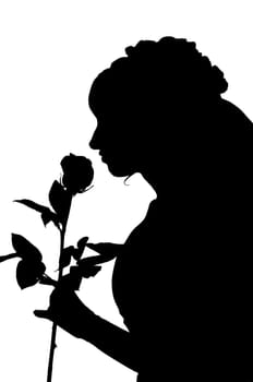 Silhouette of woman in wedding dress with rose