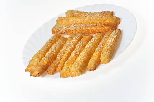 Sweet baking sticks on a white plate