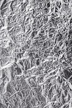 Background texture of wrinkled aluminium foil.