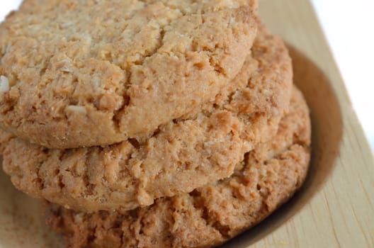 Oatmeal cookies on wood background