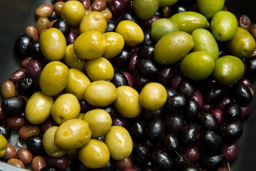 different kind of green and black olives 
