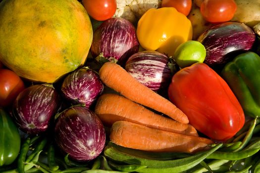 fresh vegetables and fruits on wooden table after market 