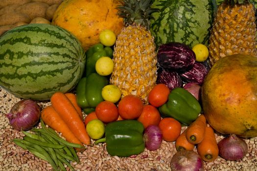 fresh vegetables and fruits on wooden table after market 