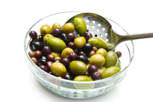 different kind of green and black olives on white background