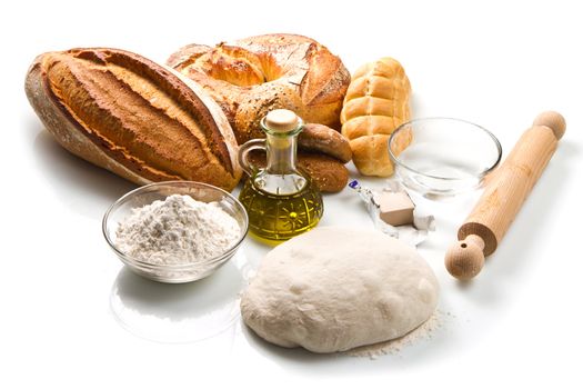 ingredients for homemade bread on white background