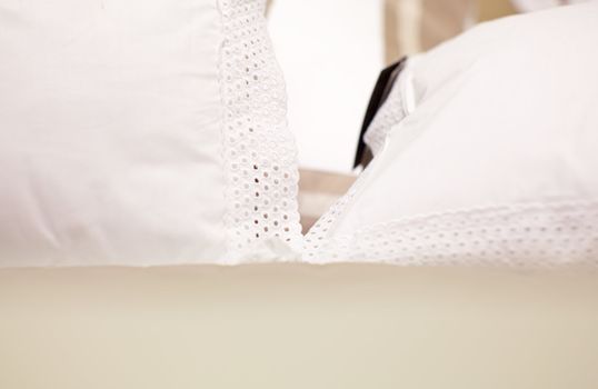 White pillows on a bed