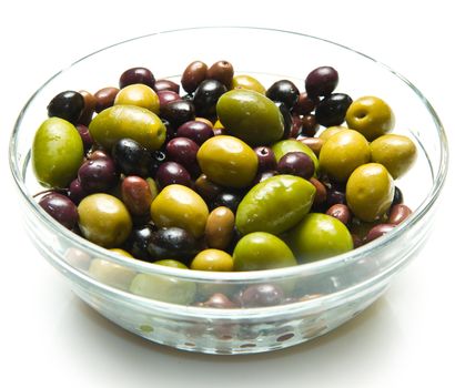 different kind of green and black olives on white background