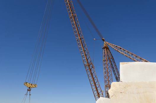 Detail of a crane lifting marble blocks in a quarry, Alentejo, Portugal