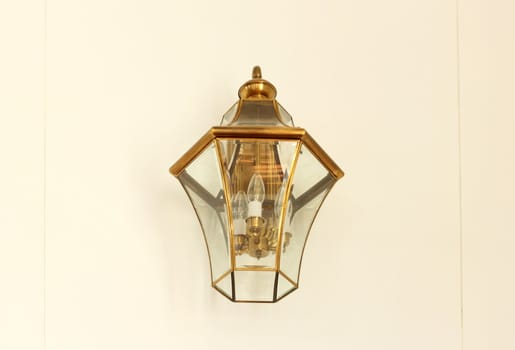 Vintage lamp on white wall