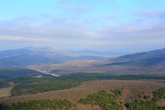 Movement of the clouds on the mountain. Crimea. Ukraine. Plateau Baba-Dag. Cave city Mangup-Kale. XIV-XVIII centuries