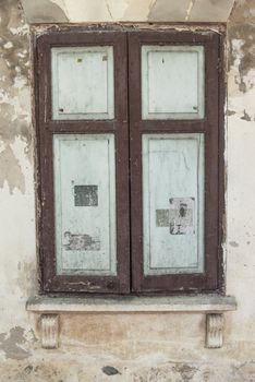 Very old vintage wooden traditional asian home windows, taken at front view