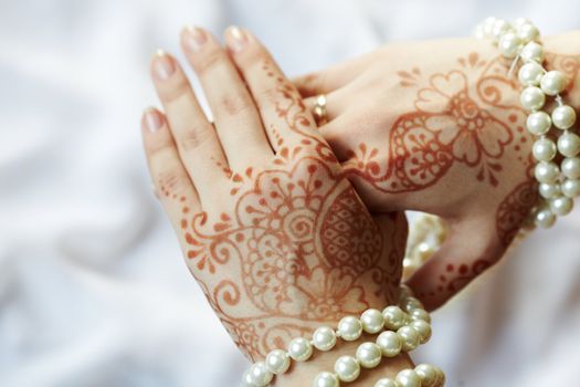 Picture mehandi on the hand of girl