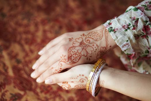 Picture mehandi on the hand of girl