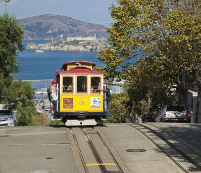 SAN FRANCISCO - NOVEMBER 2012: The Cable car tram, November 2nd, 2012 in San Francisco, USA. The San Francisco cable car system is world last permanently manually operated cable car system. Lines were established between 1873 and 1890.