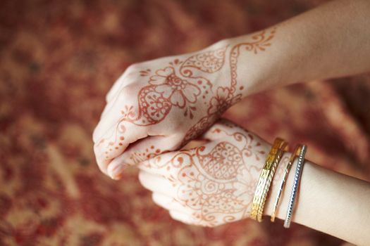 Picture mehandi on the hand of girl