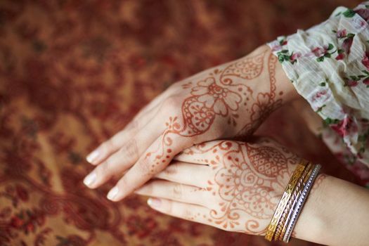 Picture mehandi on the hand of girl