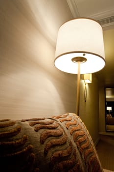 Lit lamp in a room
