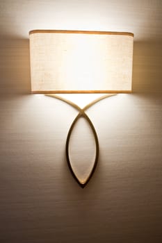 Lit lamp in a room
