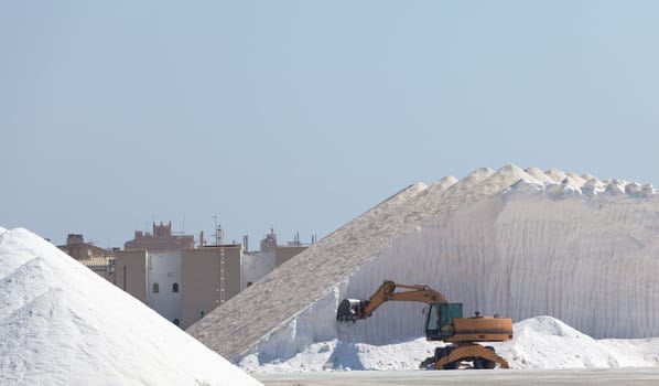 Extraction of salt. Salt mountains.