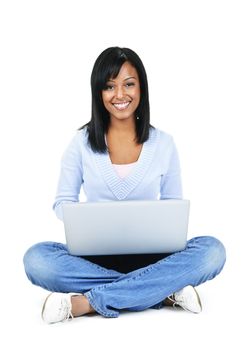 Happy black woman sitting with computer isolated on white background