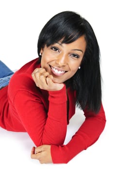 Portrait of black woman smiling laying isolated on white background