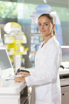 Portrait of a woman pharmacist in pharmacy
