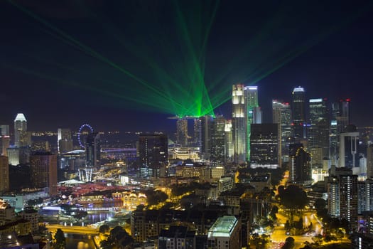 Singapore Central Business District Skyline and Laser Light Show at Blue Hour Evening