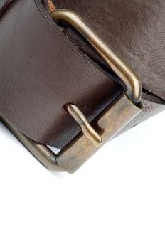 Bronze Buckle on Brown Male Belt as Frame closeup on white background