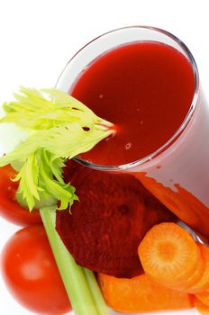 Vegetable Juice of Beet, Carrot, Celery and Tomatoes in High Glass closeup on white background