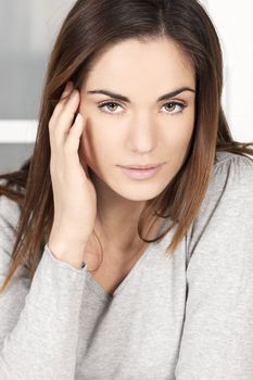 Portrait relaxed young woman at home