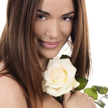 Portrait of beautiful woman with white rose 