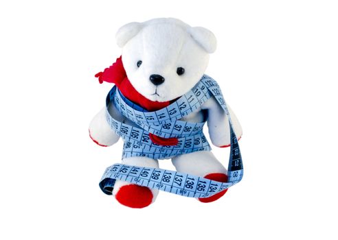 small plush Teddy with red feet wrapped blue centimeter isolated on white background