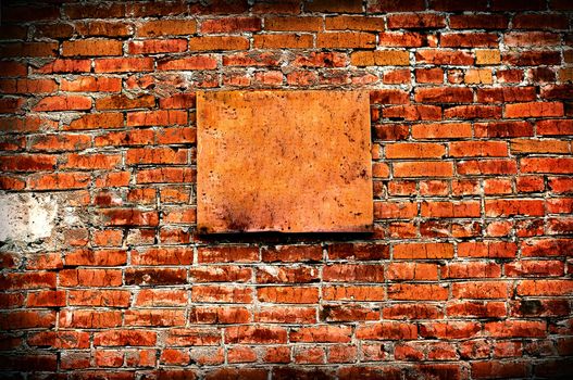 Vintage and Vignetting Photo of the Bricks Wall with Empty Board
